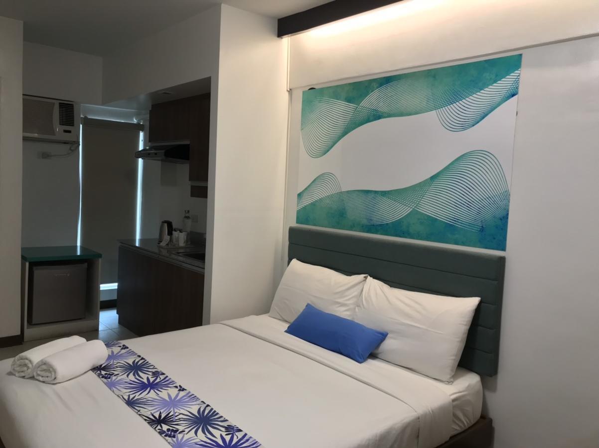 H Hotels - Metro North Uno Кесон-Сити Экстерьер фото